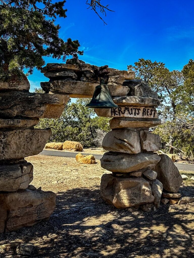 The famous arch and bell at Hermit's Rest.