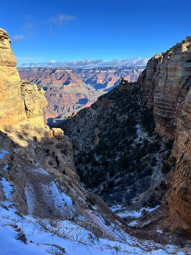South Kaibab trail switchbacks covered with a thin sheet of ice at the Grand Canyon.