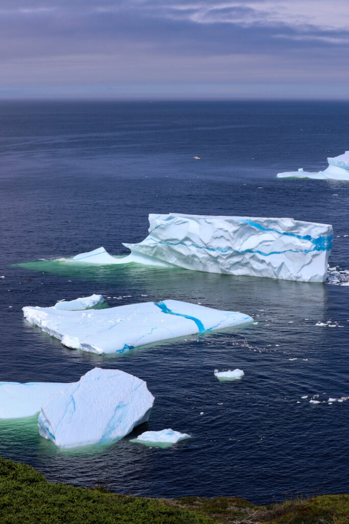 Amazing blue stripes in icebergs off the coast of Crow Head near Twillingate, NL.