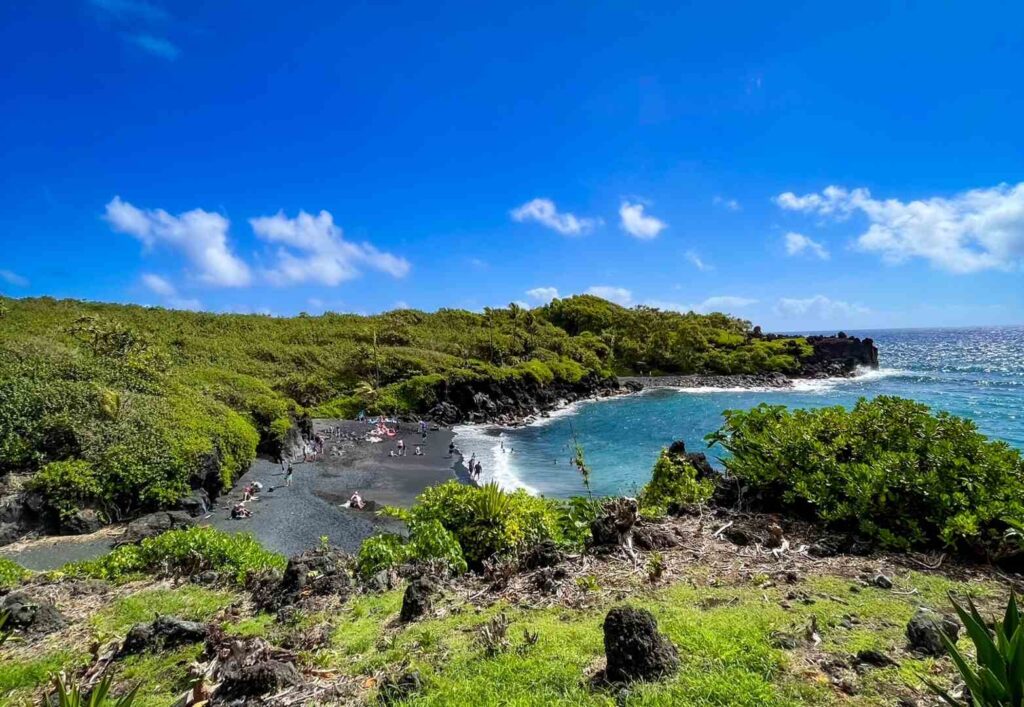 The black sand beach at Waianapanapa State Park in Maui