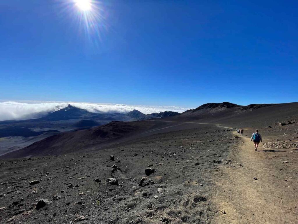 A hiker on the Sliding Sands Trail in Haleakalā National Park.