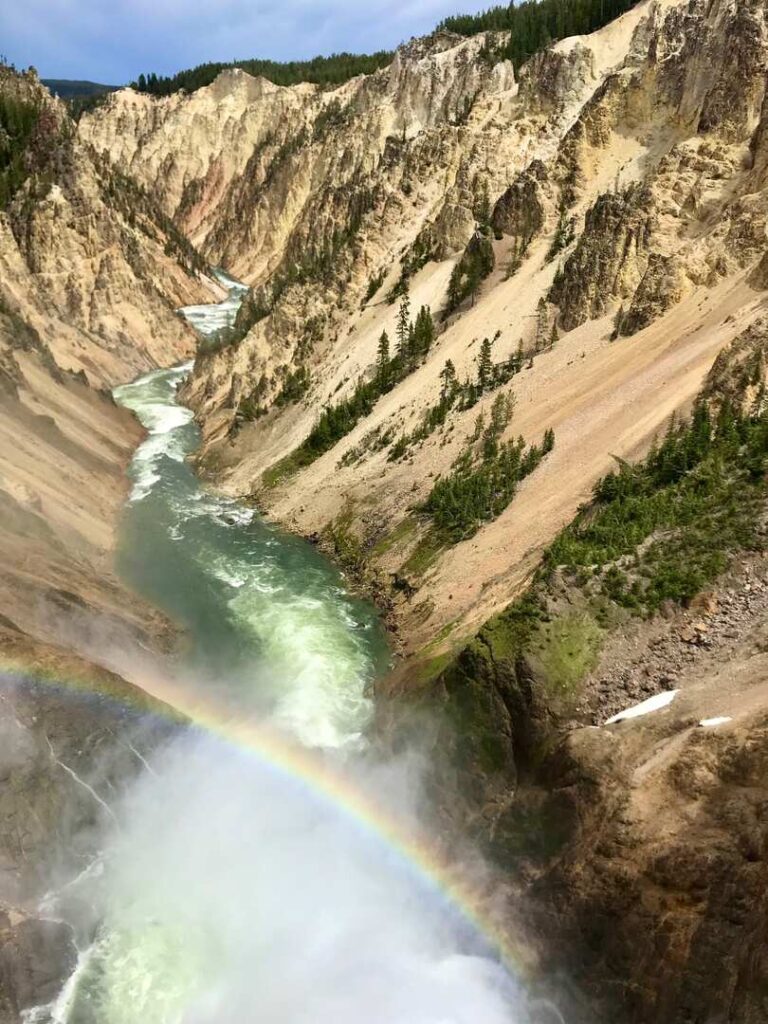 A rainbow as seen from the viewing platform on the Brink of Lower Falls Trail.