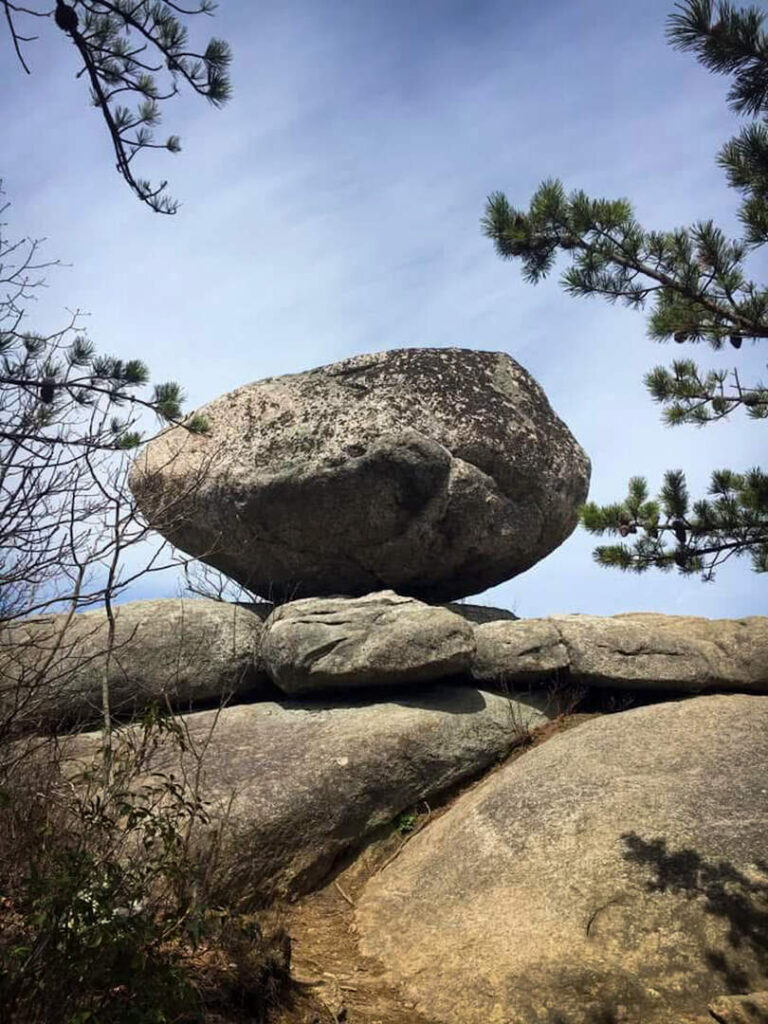 A bolder on top of the granite rocks of Old Rag.
