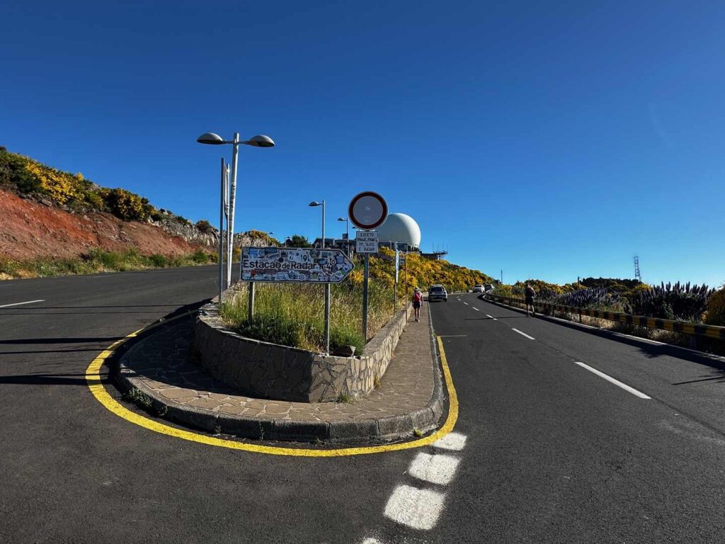 A road and parking lot near the summit where this hike starts.