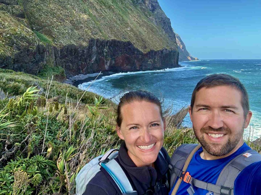Two hikers pose for a selfie at the end of the trail.
