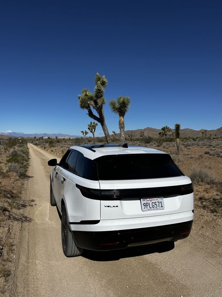 A Land Rover on the dirt Queen Valley Road, Joshua Tree.